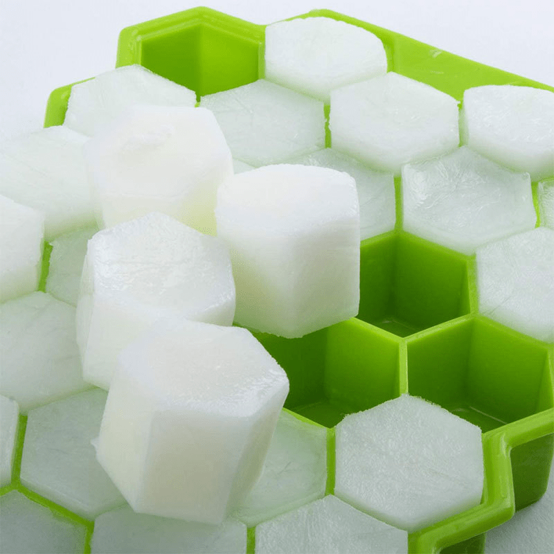 Temu 37-grid honeycomb silicone ice cube tray with hexagon-shaped cavities for making ice cubes in a honeycomb pattern.