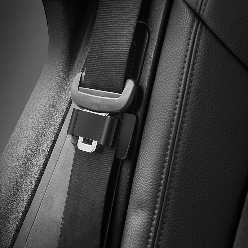 Black textured plastic seat belt stabilizer from Temu, designed to secure and stabilize seat belts in vehicles.