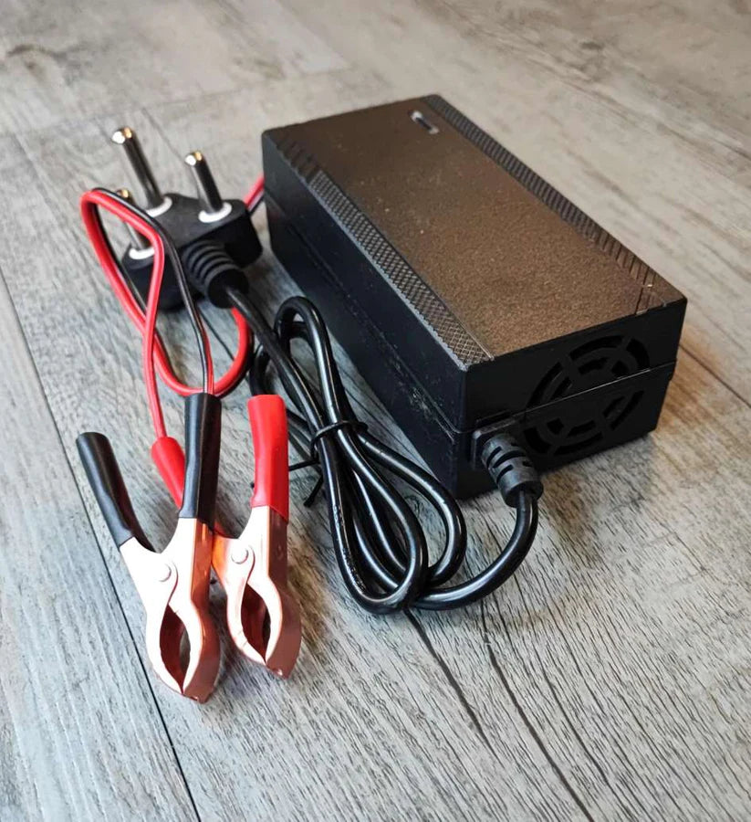 Easton ETN-803 14.6VDC 5Amp intelligent lithium battery charger connected to a battery, showing digital display and charging indicators.
