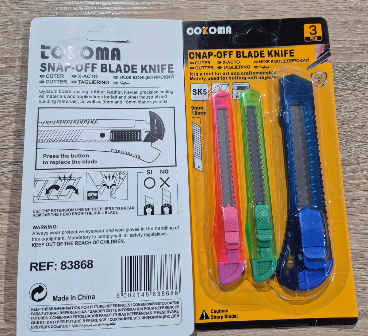 Tokoma Snap Off Blade Knife with three SK5 carbon blades, featuring a sturdy handle for precise cutting and versatile use.