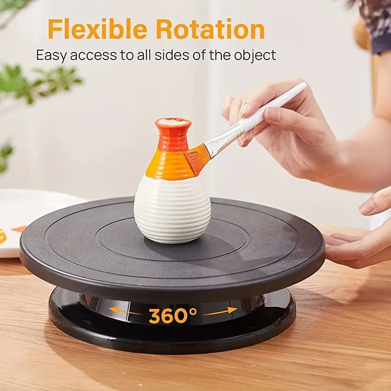 Black spinning cake turntable display stand with engraving wheels, 11-inch size, ideal for decorating and showcasing baked goods.