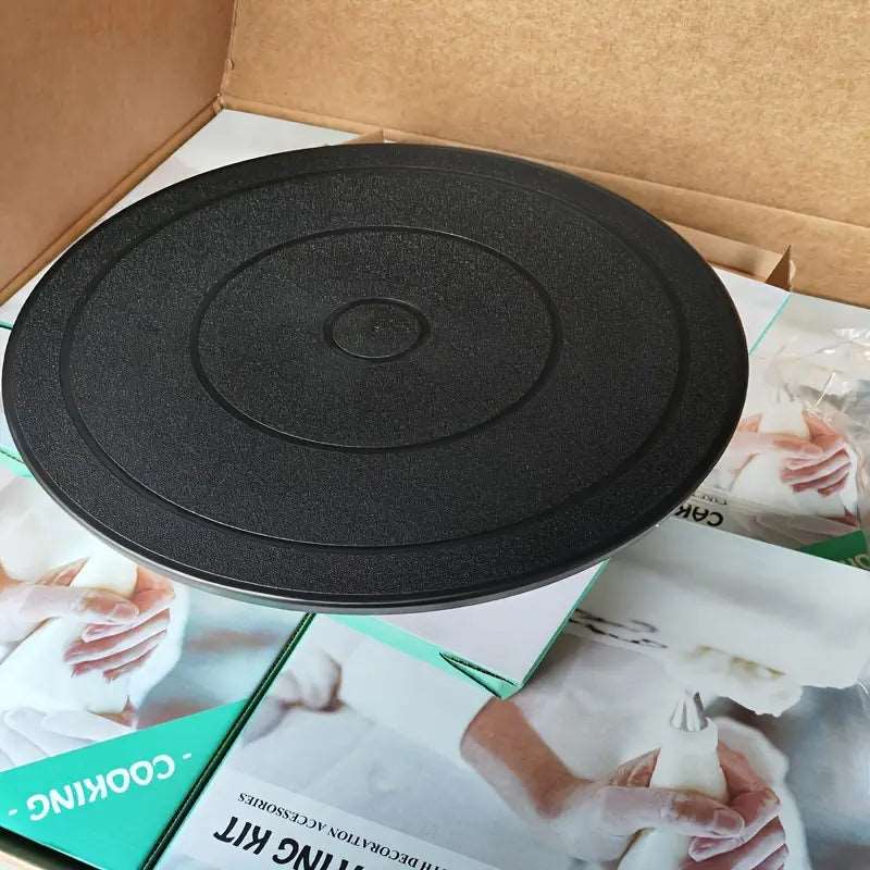 Black spinning cake turntable display stand with engraving wheels, 11-inch size, for cake decorating and presentation.