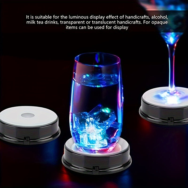 Two multicolor LED display stands with black bases and mirror tops, ideal for showcasing jewelry or collectibles.