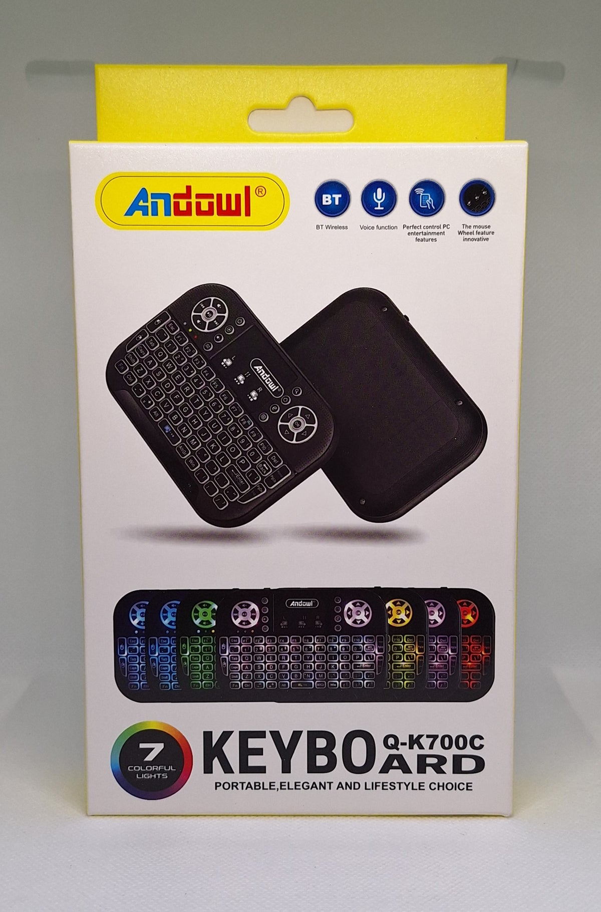 Mini portable keyboard by Little Tokyo SA with 7 colorful interchangeable lights, compact design, and built-in backlit keys.