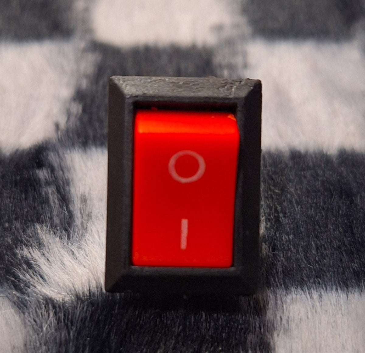 ET 6A 250V AC switch showing a compact black switch with metal terminals for electrical control.