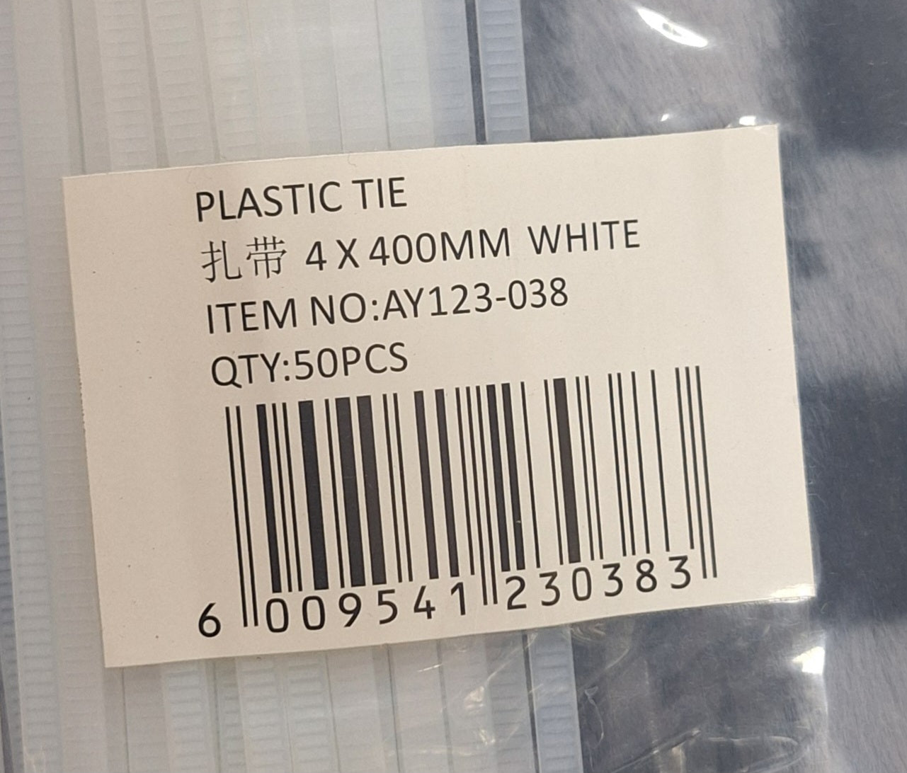 Four white plastic cable ties, 400mm length, from Little Tokyo SA, used for organizing and securing cables.