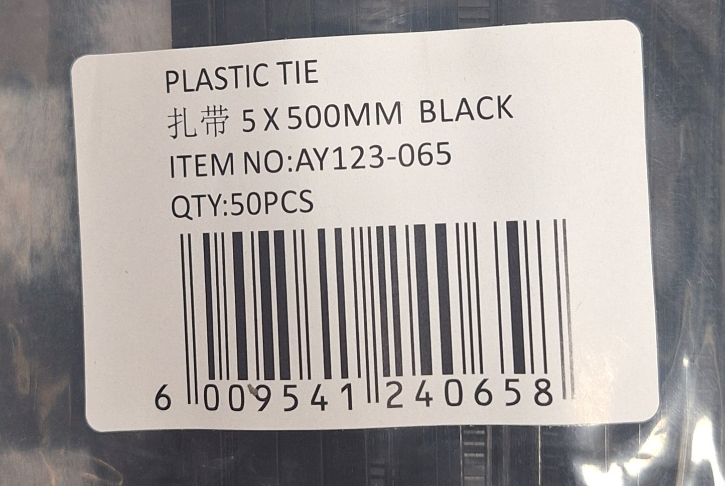 Set of 50 black plastic cable ties, 5x500mm, from Little Tokyo SA, used for organizing and securing cables.
