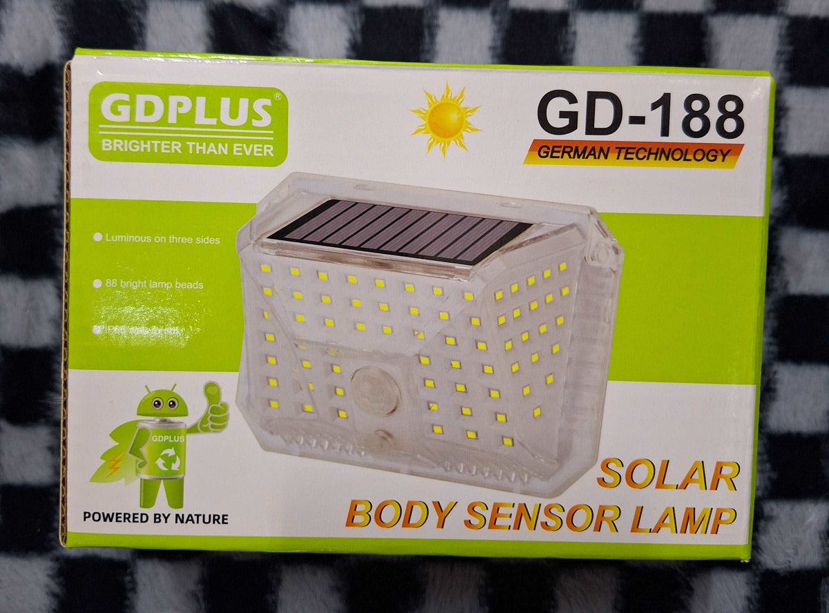 ET GDPLUS Solar Motion Lamp illuminating an outdoor area with a sleek, modern design and solar panel for energy efficiency.