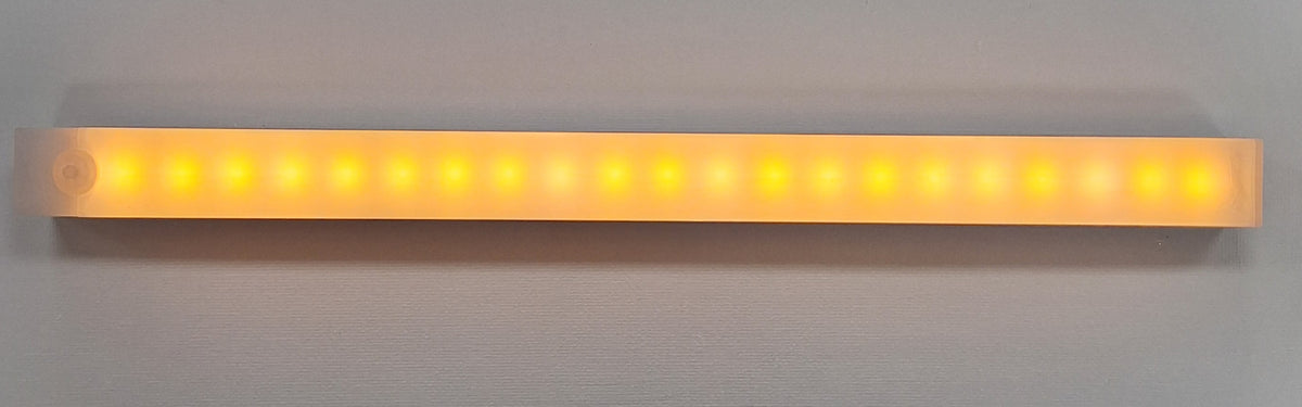 Little Tokyo SA MYT 300mm Rechargeable LED Long Sense Light in warm white, showing the sleek, elongated design and warm illumination.