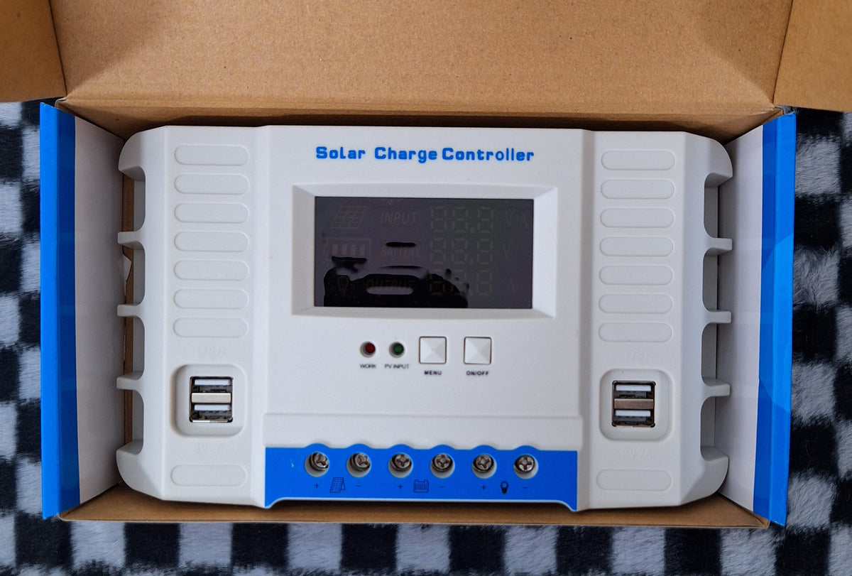 ET PWM solar charge controller with USB ports, 50A 12V/24V, used for solar power system management and device charging.