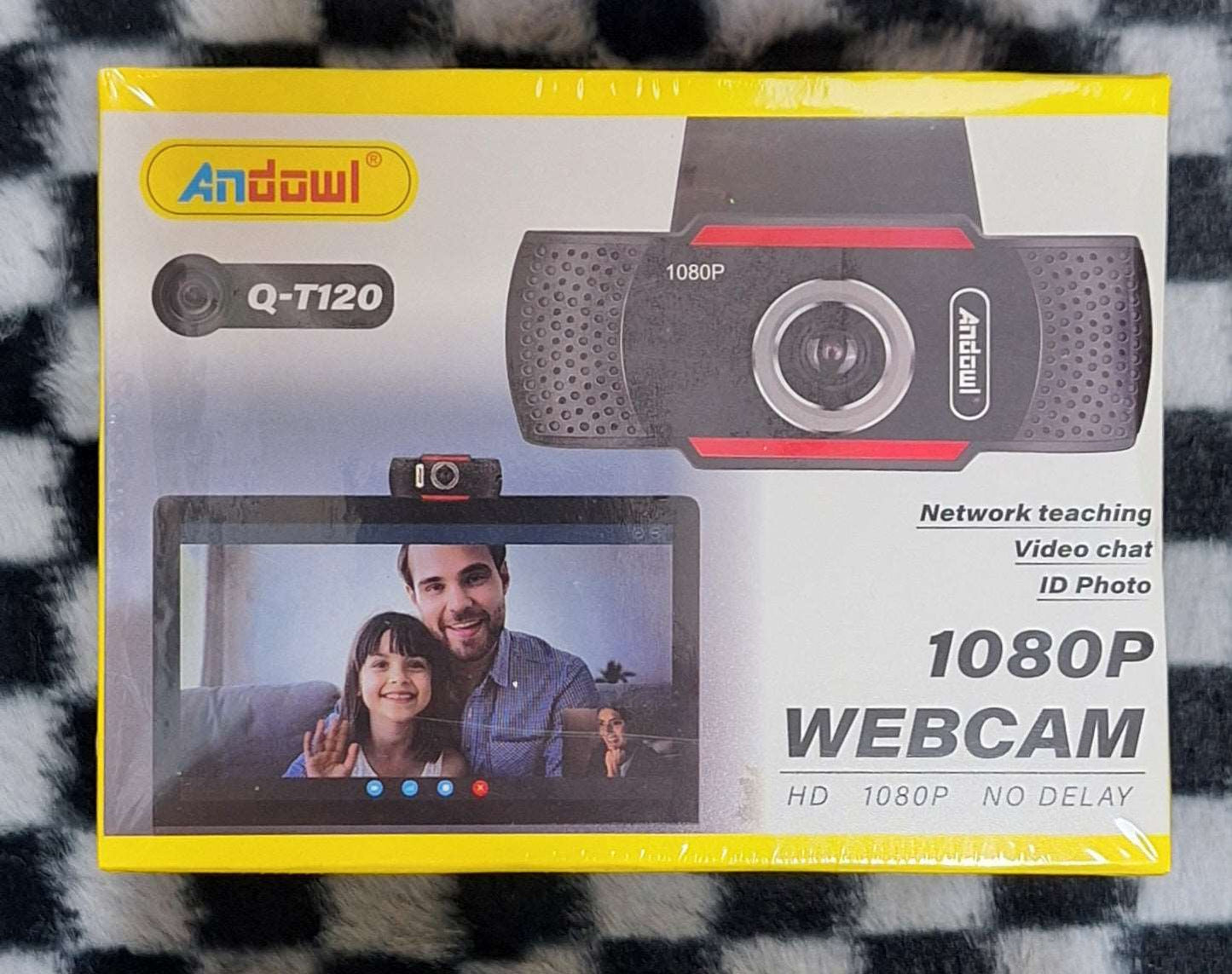 Little Tokyo SA Andowl Q-T120 HD 1080P webcam showing a sleek black device with adjustable stand and built-in lens for video calls