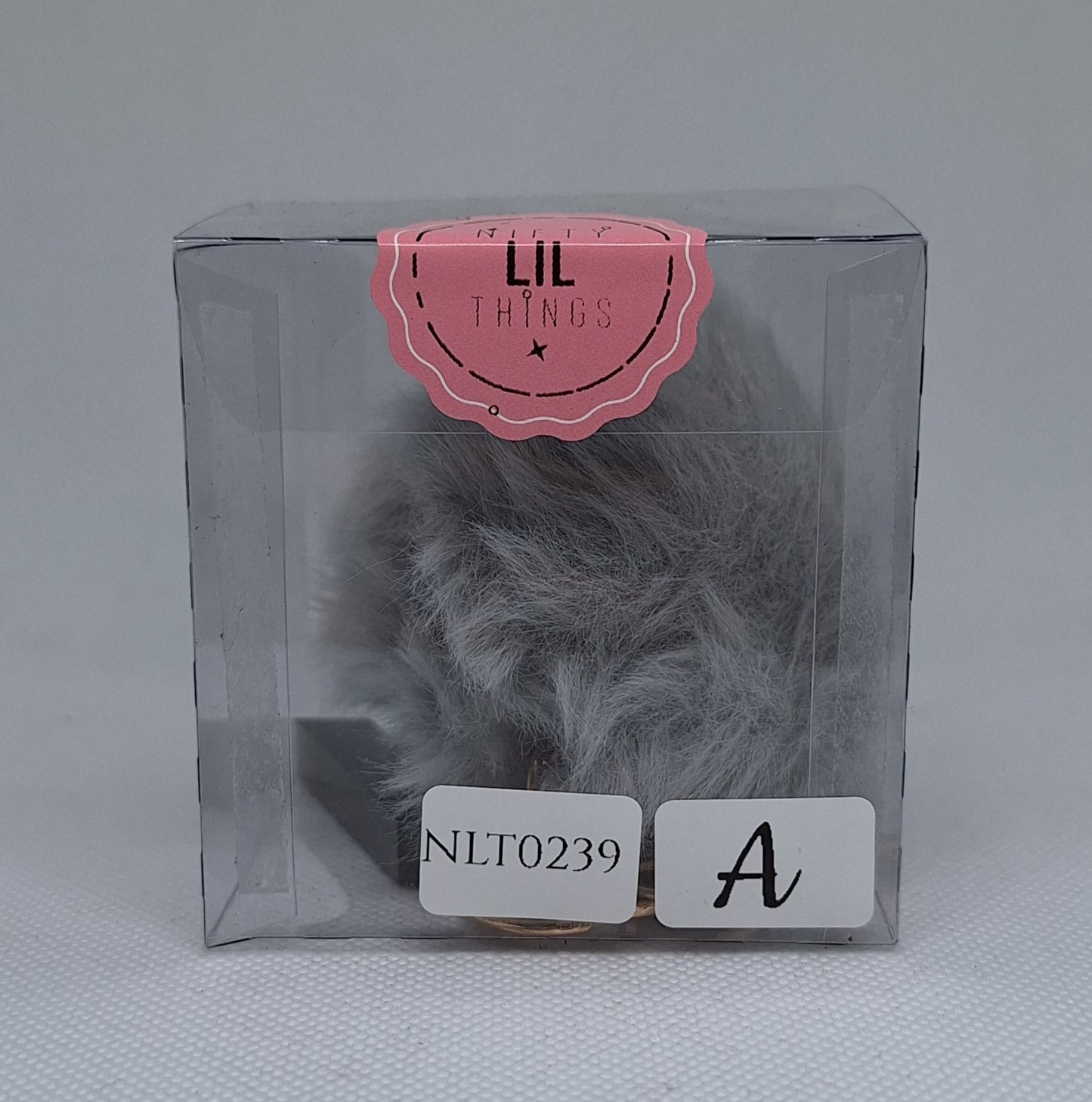 Custom Resin Letter Keychain With a Grey Pom Pom - A Custom Resin Letter Keychain With a Grey Pom Pom - A