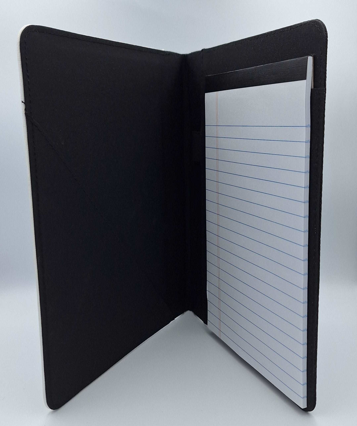 Custom-made printed notepad by Nifty Lil Things with colorful floral design on white paper, ideal for note-taking and organization.