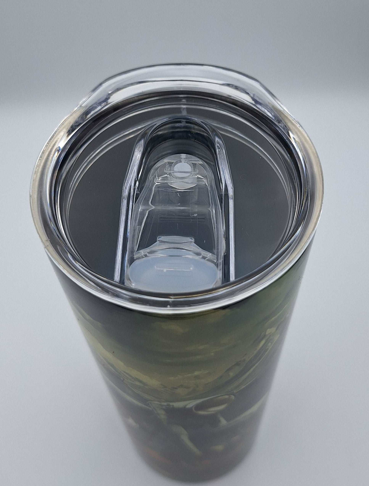 Custom printed 20oz hot and cold tumbler by Nifty Lil Things, showing a sleek stainless steel design with personalized print.