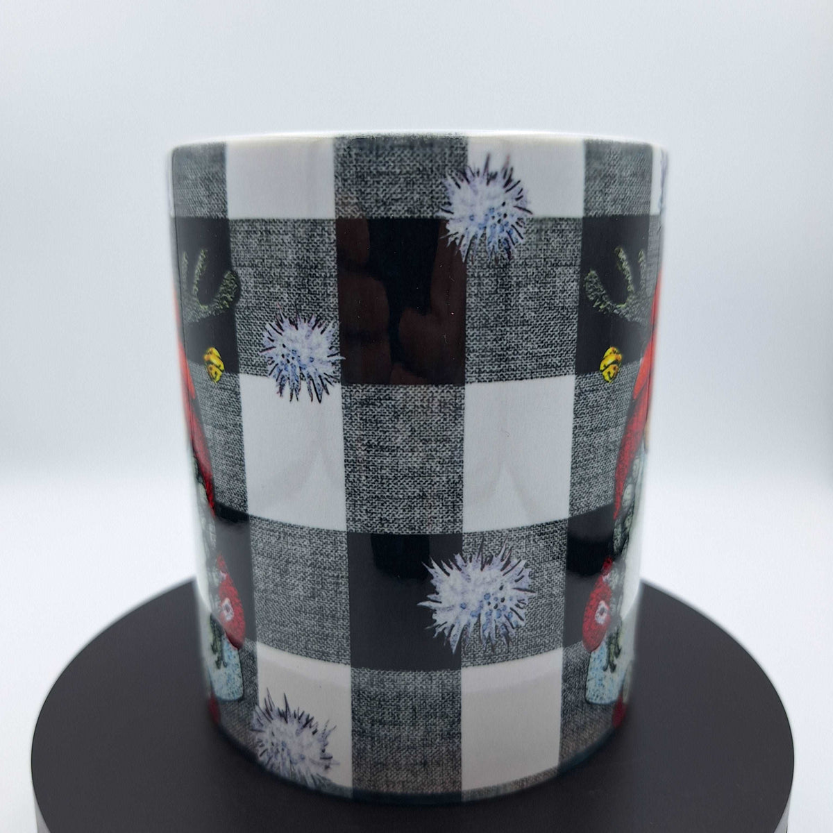Custom printed coffee mug from Nifty Lil Things with a personalized design on a white ceramic mug.