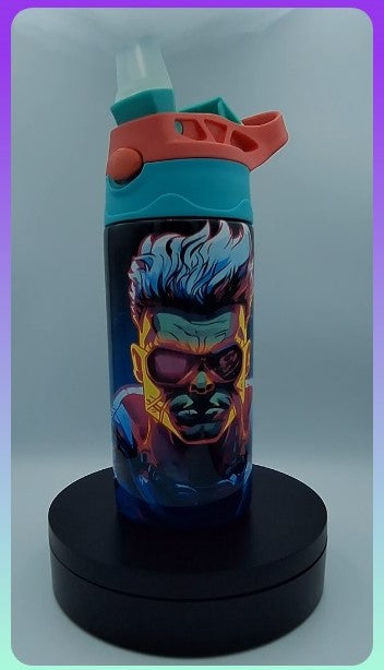 Custom printed 12oz kids' hot/cold tumbler with nozzle and handle by Nifty Lil Things, featuring colorful design and durable construction.