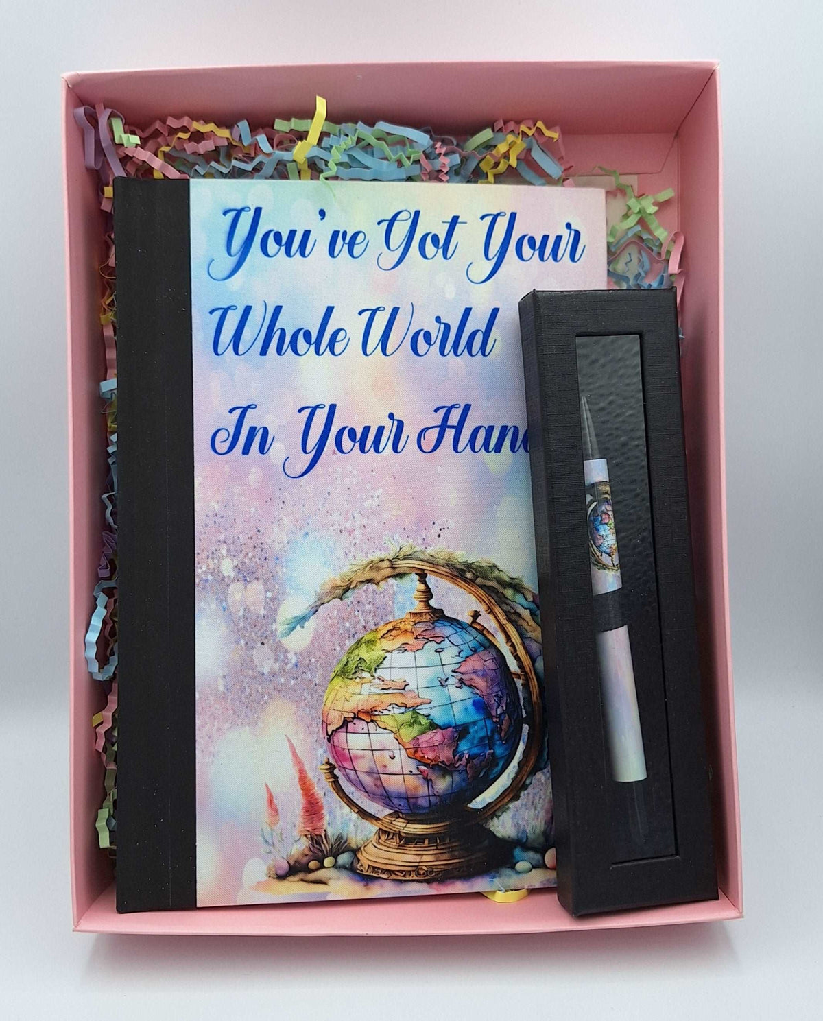 Custom printed notebook with quote and matching pen by Nifty Lil Things, featuring a sleek cover and elegant writing accessories.