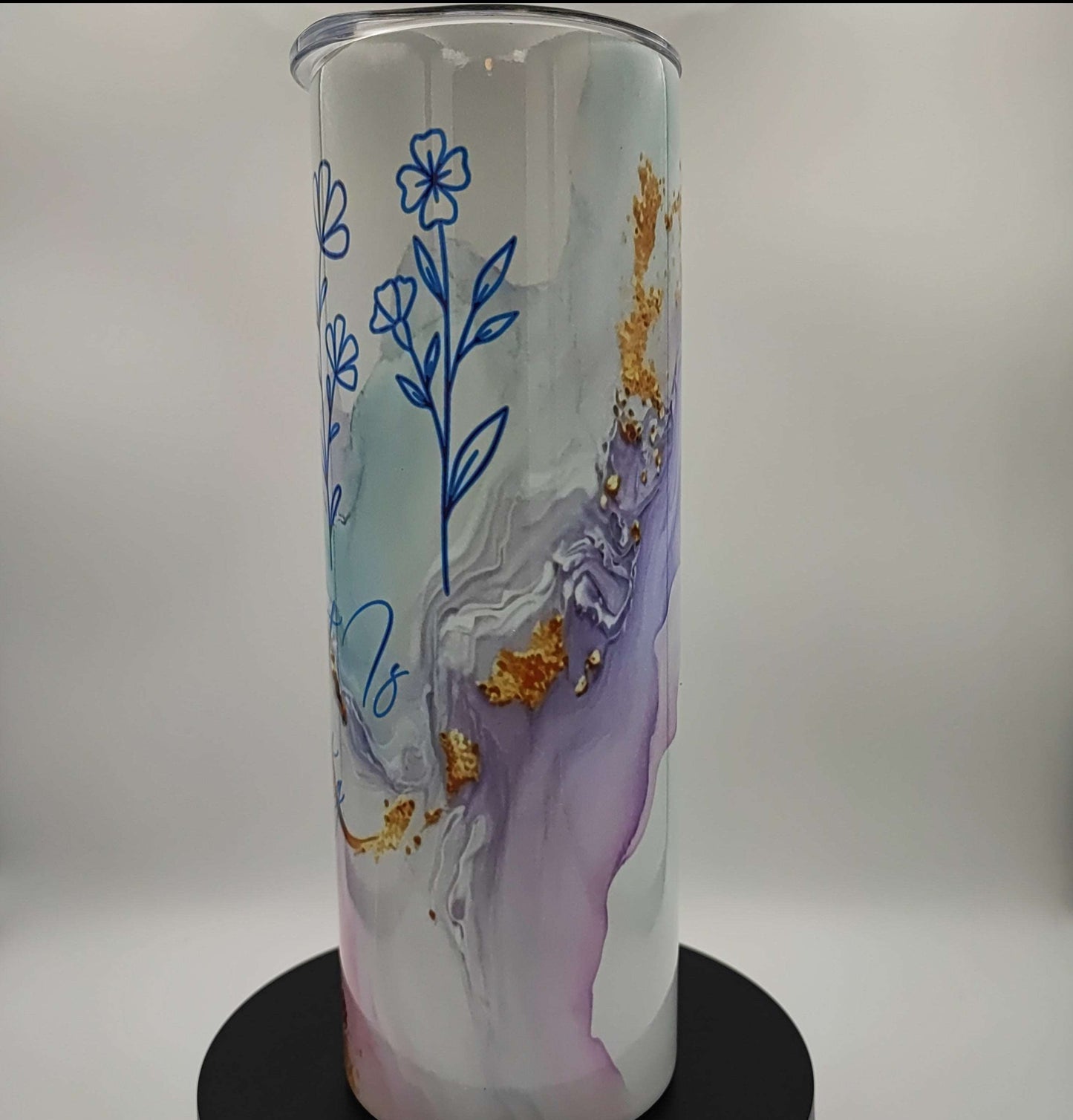 Custom printed 20oz Nifty Lil Things travel mug, hot and cold tumbler with a sleek design and sturdy handle for travel.