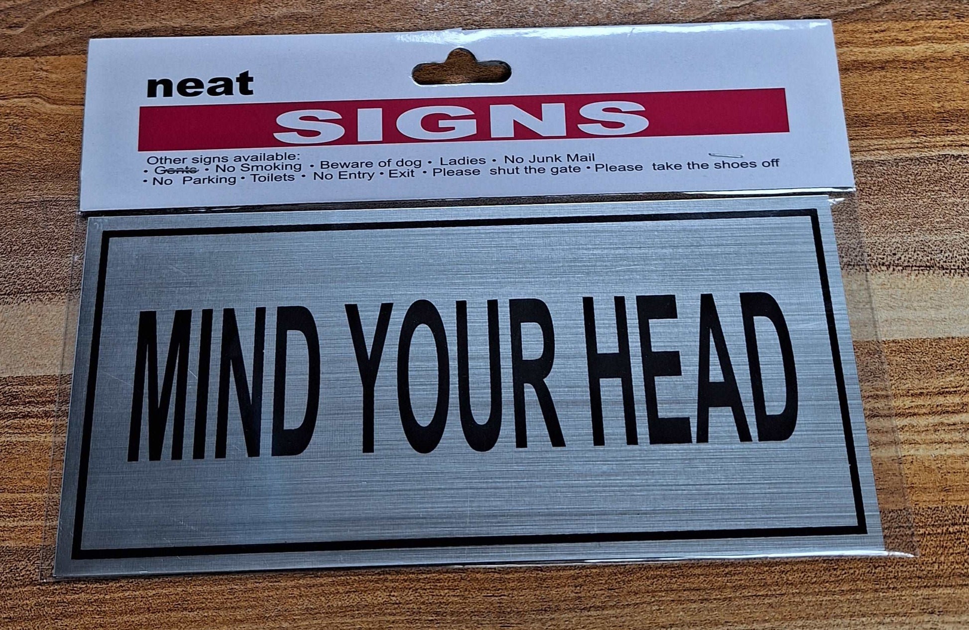 Mind Your Head Metal Sign