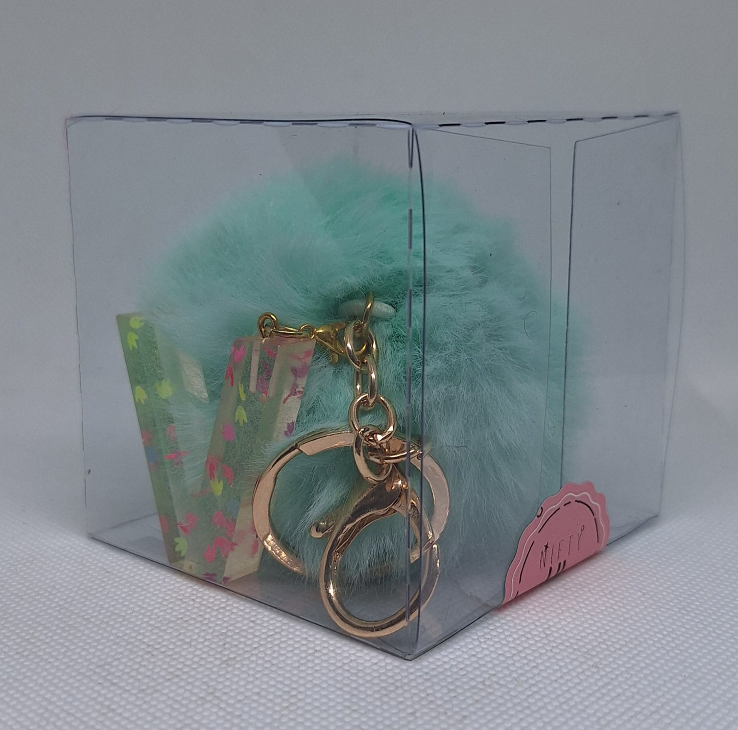 Custom Resin Letter Keychain With a Turquoise Pom Pom - V