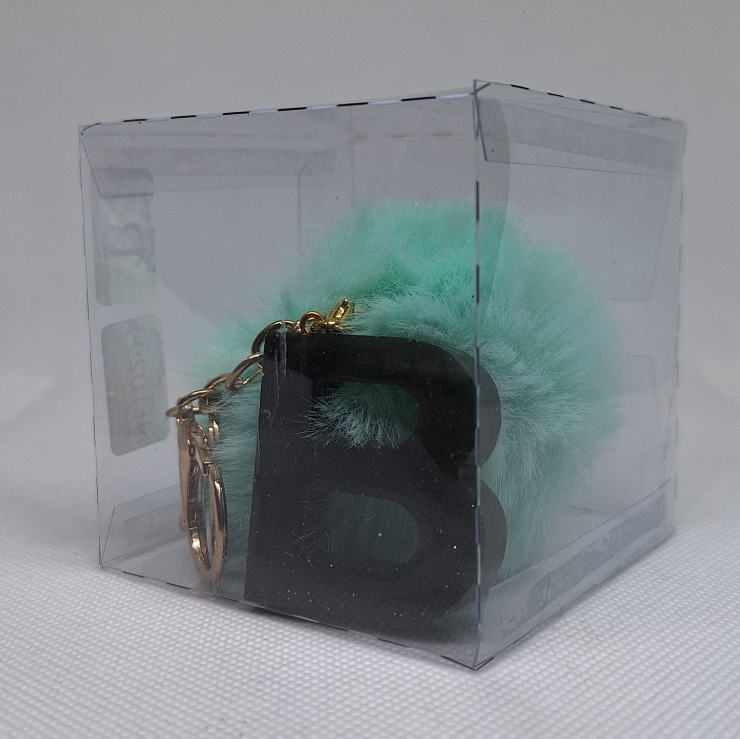 Custom Resin Letter Keychain With a Turquoise Pom Pom - B