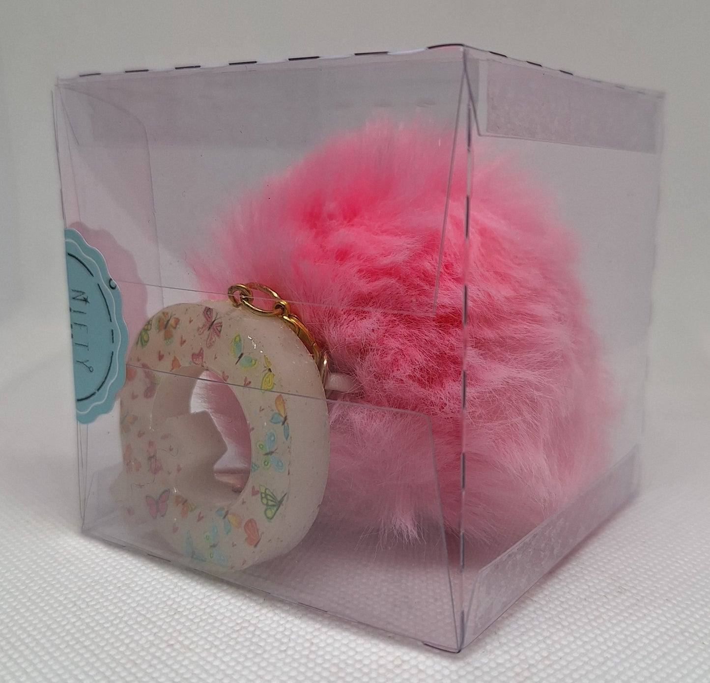 Custom Resin Letter Keychain With a Pink Pom Pom - Q