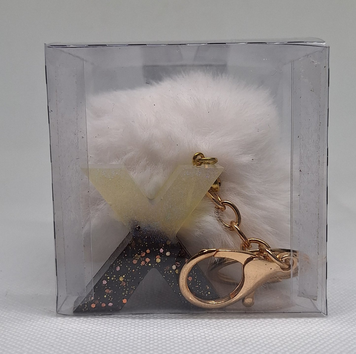 Custom Resin Letter Keychain With a White Pom Pom - X