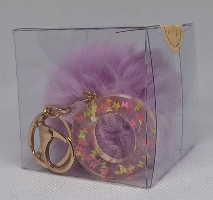 Custom Resin Letter Keychain With a Purple Pom Pom - O