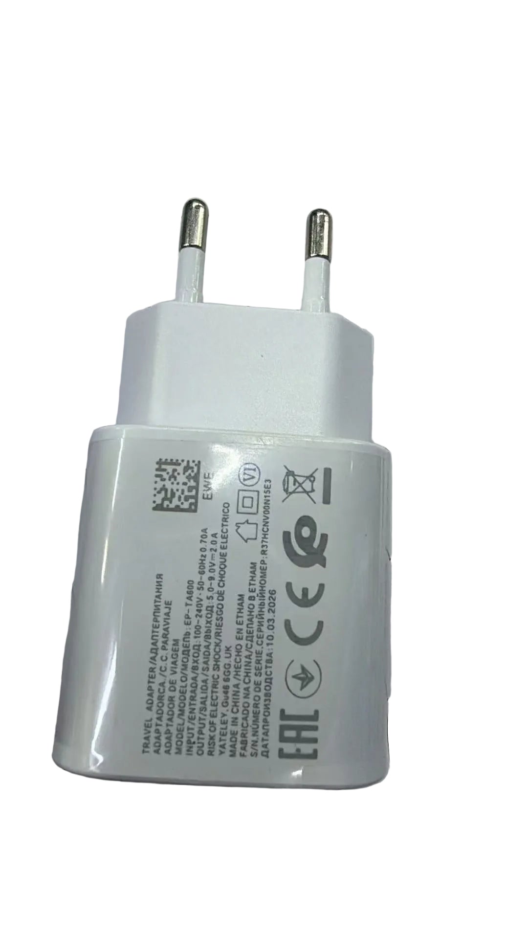 ET USB wall charger with compact white plug and single USB port against a plain background