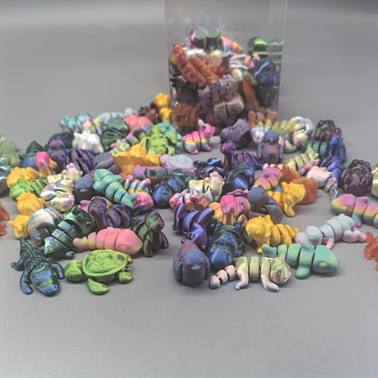 Set of 60 colorful 3D printed animal kingdom figures in various styles and poses, perfect for collection or educational display.