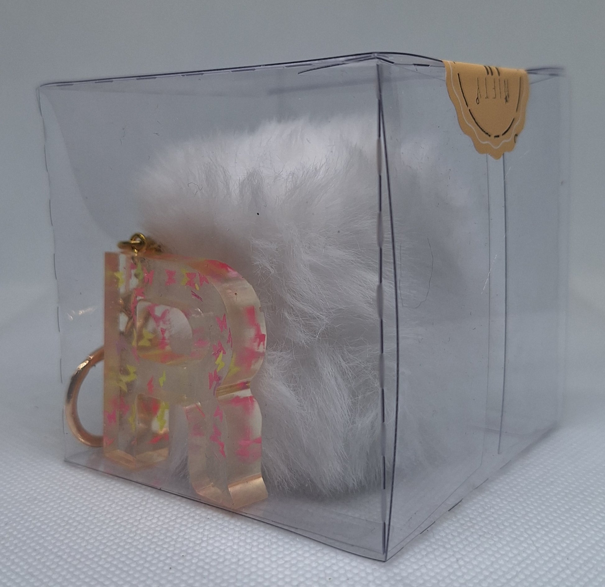 Custom Resin Letter Keychain With a White Pom Pom - R - Little Tokyo SA